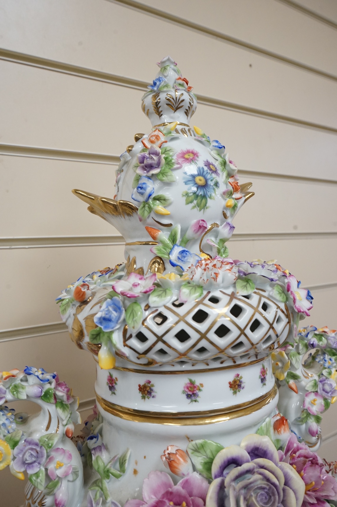A large 20th century German porcelain two-handled pedestal vase and cover, 89cm